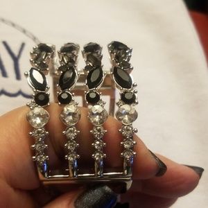 Hinged bracelet with blk, gray, clear stones